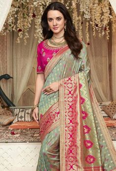 This elegant Sage Green Saree is crafted from lightweight fabric, allowing for an airy and comfortable feel. Featuring an intricate decorative border and hand-embroidered detailing, this Saree is the perfect choice for any special occasion. Made from traditional fabric, this design offers a timeless, classic look. Stitching Option - We will email you the measurement guide to confirm your size. FABRIC: Heavy Soft Silk SAREE FABRIC SIZE: 5.5 Meters BLOUSE FABRIC SIZE: 0.80 Meters SHIPPING: The pro Salwar Dress, Party Sarees, Gaun Fashion, Casual Saree, Green Saree, Net Saree, Clothing Catalog, Printed Saree, Top Models