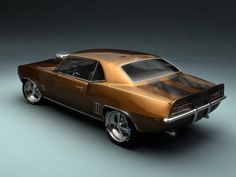 a brown muscle car on a gray background