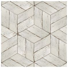 an old white wooden wallpaper pattern that looks like hexagonal tiles or herringbones