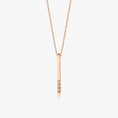 Our Solid Gold Diamond Vertical Bar Necklace is perfect for all classic lovers. It is indispensable for your jewelry box as it is magnificent and elegant. FEATURES * Made to order. * Gold KT: 14K * Gold Color Selection: Yellow Gold, Rose Gold, White Gold * Diamond Quality: Diamond carat: 0.02 ct. Cut: Perfect cut Diamond type: Zircon Setting Type: Prong Setting * Pendant Lamp Height: 15 mm / 0.59 inch * Pendant Width: 1 mm / 0.03 inch * Length: 14", 16", 18", 20" * Ready to Ship in 1-3 Business Elegant Diamond Necklace With Rectangular Pendant For Formal Occasions, Classic Diamond Necklace With Rectangular Pendant For Formal Occasions, Classic Diamond Bar Necklace For Formal Occasions, Classic Formal Diamond Necklace With Rectangular Pendant, Elegant 14k Gold Necklace With Rectangular Pendant, Elegant Rose Gold Bar Necklace For Gift, Elegant Rose Gold Bar Necklace Gift, Elegant Diamond Bar Necklace In Yellow Gold, Elegant Yellow Gold Diamond Bar Necklace