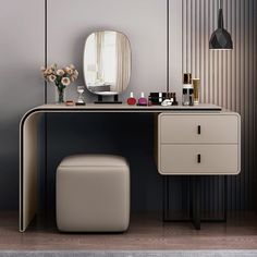 a vanity with a mirror, stool and flowers on the table in front of it