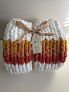 Custom order chunky hand knit throw blanket.  Size: 48 x 60 Primary Color Options: White or Ivory Can choose up to three different color options for stripes