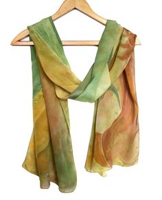 Silk Scarf hand painted in green and brown for women. Women Fall silk scarf with painted Lady. Long batic style silk scarf.Give your outfit a feeling of ladies elegance with this gorgeous green / brown scarf. I hand dyed it to create a unique abstract Lady in green pattern that will match any outfit, starting from casual and finishing by fancy ones. The scarf is handmade of on high quality natural crepe silk, which will fit both summer and winter. It is an accessory for women who are feminine an Artistic Hand Painted Green Silk Scarf, Artistic Hand Dyed Green Silk Scarf, Hand Painted Green Silk Scarf, Artistic Hand-dyed Green Scarves, Style Silk Scarf, Fall Scarf, Green Silk Scarf, Brown Scarf, Ladies Scarf