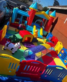 an inflatable bouncy castle with toys on it