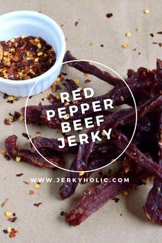 red pepper beef jervy is on the table next to it's bowl