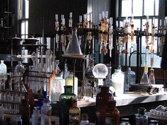 an old fashioned lab filled with lots of glassware