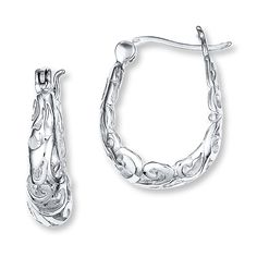 Intriguing swirls dance around these oval hoop earrings for her. Styled in polished sterling silver, these fashion jewelry earrings are secured with hinged backs. Oval Hoop Earrings, Kay Jewelry, Jewelry Advice, Jewelry Sale, Sterling Silver Filigree, Fashion Jewelry Earrings, Sterling Silver Hoop Earrings, Stunning Earrings, Accessories Jewelry Earrings