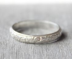 Beautiful handmade solid .925 sterling silver band. Add engraving: https://www.etsy.com/listing/718094264/custom-ring-engraving-inside-ring?ga_search_query=engrave&ref=shop_items_search_1&frs=1 If you don't see your size please feel free to message me. All orders ship in a gift box. If you are ordering multiple items and want them boxed separately, please let me know in the notes at checkout. I ship via USPS. Please review the estimated delivery date and processing times. Processing time Sterling Silver Engraved Ring For Wedding, Silver Engraved Promise Bands, Silver Etched Stackable Rings For Anniversary, Wedding Engraved Sterling Silver Ring, Anniversary Band Engraved Ring, Silver Bands With Engraving Option For Anniversary, White Gold Engraved Ring Stamped 925 For Wedding, White Gold 925 Stamped Engraved Ring For Wedding, Sterling Silver Engraved Ring With Decorative Band For Promise