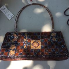 NWT Beaded evening bag Brown beaded evening bag. Brand new!!! Bags Garmet Bag, Carpet Bag Purse, Patchwork Clutch, Red Leather Handbags, Jute Tote Bags, New Bags, Brown Leather Wallet, Beaded Evening Bags, Bags Vintage