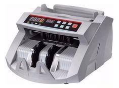 an automatic cash register machine with two rolls of money