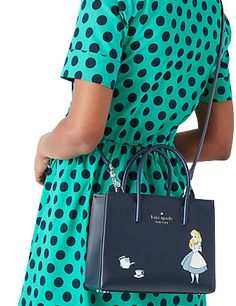 7'' h x 8.4''w x 3.1''dhandle drop: 3.54''strap drop: 22"textured pvcmetal pinmount logocotton twill lininginterior back zip pocketdrawstring closurestyle # wkr00599Color: Multi Crossbody Shoulder Bag For Disney Trips, Disney Shopping Bags, Kate Spade Crossbody, Kate Spade New York, Alice In Wonderland, Kate Spade, Crossbody Bag, New York, Disney