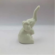 PRICES MAY VARY. Size: 4 x 1.5 x 1.5 inches High Quality Ceramics: White elephant figurine decor is made from non-toxic, strong and high quality glazed ceramic, not easy to break, can be used for a long time. It is a good wall shelf decor Home Decor Accent: This white elephant desk decor could be used as beautiful home decorations,fits easily into any decor including bedroom,bathroom, living room or kitchen White Elephant Room Knick Knacks Decor, Exchange Gift Ideas, Elephant Statue Decor, Decor For Shelves, Elephant Ceramics, Clay Elephant, Handmade Bookshelves, Statues Home Decor, Gift Ideas For Adults