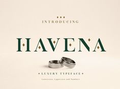 two wedding rings sitting on top of each other in front of the word havena