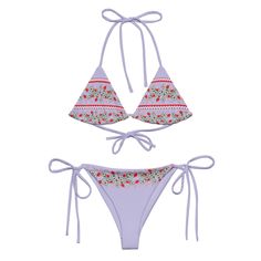 Stay comfortable and stylish all summer with this All-Over Print Recycled String Bikini set. It’s made from soft recycled polyester with double-layering and UPF 50+. Style the straps how you like, and get ready to swim! • Soft and stretchy material with UPF 50+ • Sizes up to 6XL • Bikini top comes with removable padding for comfort • Multiple ways to tie and style the bikini set • Color design options for swimwear lining Disclaimers: • Due to the 2-layered construction and internal stitching, a visible stitch may appear in the crotch seam of the bikini bottom. This is a normal part of the manufacturing process and does not impact the quality or performance of the product. • To make your All-Over Print Recycled String Bikini last longer, thoroughly rinse it off after each use and get rid of Summer Festival Swimwear With Adjustable Straps, Adjustable Straps Summer Swimwear For Festivals, Festival Swimwear With Adjustable Straps, Festival Swimwear With Adjustable Straps And Stretch, Summer Festival Triangle Top Tankini, Summer Festival Tankini With Triangle Top, Strawberry Heart, Strawberry Hearts, 50 Style