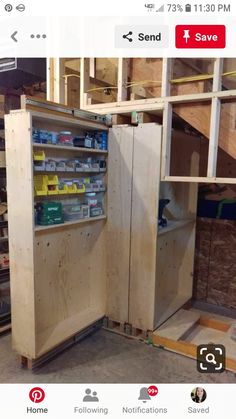 the inside of a storage unit with shelves and tools on it in a building under construction