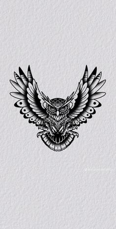 an owl with wings on its head is shown in black and white, as well as the