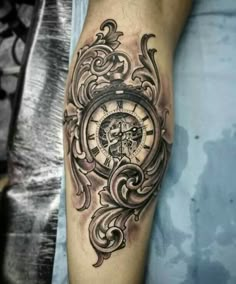 a man with a clock tattoo on his leg