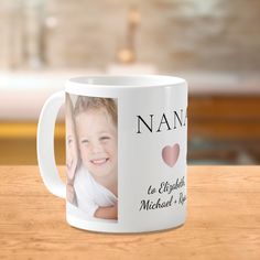 a coffee mug with an image of two children on it