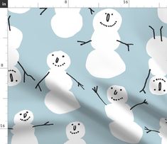 a blue and white pattern with snowmen on it