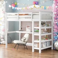 a white loft bed sitting next to a desk with a chair and balloons on the wall