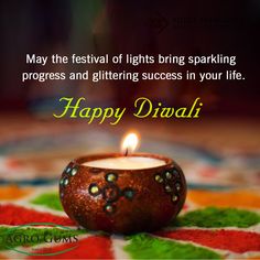 happy diwali greeting card with lit candle