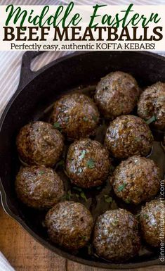 a close up of meatballs in a pan on a wooden table with text overlay