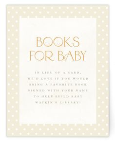 a card with the words books for baby in gold foil on white polka dot paper