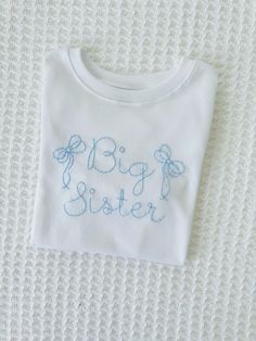 Hand embroidered Big Sister T-shirt. This high quality, minimalistic design is perfect for your little toddler for pictures, baby announcements, and more! Big Sister Shirts, Sister T Shirt, Hand Embroidered Shirt, Big Sister Announcement, Big Sister T Shirt, Sister Tshirts, Baby Announcements, Big Sister Shirt, Sister Shirts