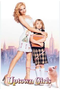 the movie poster for up town girls with a woman holding a small child and pig