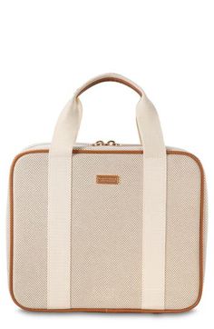 A roomy cosmetics case with top-carry handles and four removable compartments makes organizing bathroom essentials easy. Top zip-around closure   Carry handles   Four removable compartments   60% recycled polyester, 40% recycled preconsumer cotton   Wipe with damp cloth   Imported White Cosmetic And Toiletry Storage For Travel, Cream Rectangular Cosmetic Bag For Travel, Rectangular Cream Travel Cosmetic Bag, Functional Beige Rectangular Luggage, Organizing Bathroom, Stephanie Johnson, Bathroom Essentials, Makeup Case, Bathroom Organization