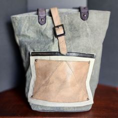 Due To A Family Emergency, I Find Myself Needing To Sell My Designer Handbag Collection. Please View My Other Items. There Will Be More Posted Everyday. All Offers Are Welcome. Pet Free / Smoke Free *Discounted Shipping* Nwot Moto Glam Tote Bag By Mona B This Bag Has Been Stored Since Purchased. The Only Blemish Is ~4 Stitches On The Corner Of The Back Pocket Did Not Sew. It Came That Way. Given The Upcycled Nature Of Mona B Items, It Is Not Noticeable And Does Not Alter Function In Any Way. A R Khaki Tote Bag For On-the-go, Large Capacity Bucket Shoulder Bag In Coated Canvas, Coated Canvas Bucket Shoulder Bag For Travel, Coated Canvas Bags With Large Capacity For Errands, Large Capacity Coated Canvas Bucket Shoulder Bag, Large Capacity Coated Canvas Bag For Errands, Daily Use Coated Canvas Bucket Shoulder Bag, Coated Canvas Bucket Satchel, Everyday Bucket Shoulder Bag With Canvas Lining