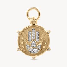 14k Yellow Gold Charm with Natural Sapphires, Emerald, and Diamonds. The hamsa symbolizes happiness, luck, wealth and good fortune. This 14k yellow gold and diamond charm features an evil eye on one side with sapphires and emerald and a diamond hamsa on the other side. It showcases a top switch mechanism that allows you to rotate the jump ring so the charm is multi-functional and can be worn as an earring charm on hoops or as a pendant on a chain necklace. Audry Rose, Diamond Locket, White Diamond Necklace, Earring Charm, Rock Rings, Hamsa Pendant, Instagram Jewelry, Buckle Ring, Diamond Charm