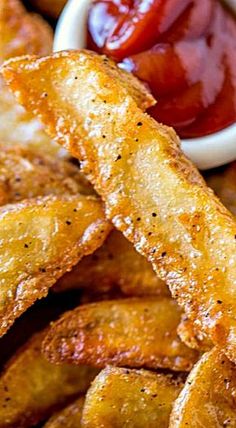 some fried food on a plate with ketchup