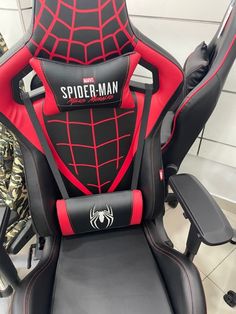 a spider man gaming chair with red and black accents