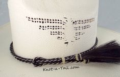 Elegant beauty Cowboy hat horsehair hat band: Multi- strand horsehair with double Side tassels Boldest ** black center with a stunning natural white whip-stitched edge Unique, distinctive and exceptional quality. Everything you want in a Horsehair hat band and MORE! Brings out your spirit in an exclusive design that is vibrant as your western lifestyle. Measurements * Longest length 26.75 inches * Shortest length about 15 inches * Width a touch over 3/8 inch wide Exceptional details *You will no Country Style White Hat Bands For Kentucky Derby, Traditional White Hat For Rodeo, Traditional White Rodeo Hat, Handmade Western White Hat Band, Custom White Hat Bands For Rodeo, Traditional White Hat Bands For Rodeo, Custom White Hat Bands For Beach, Traditional White Brimmed Hat Bands, Traditional White Adjustable Hat Bands