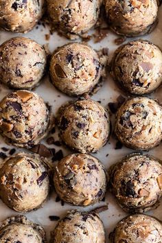 chocolate chip muffins on a baking sheet ready to be eaten