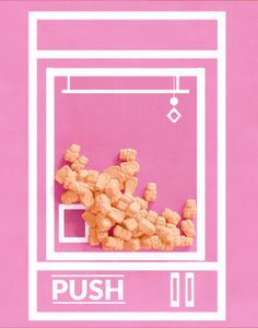 a pink poster with the words push in front of a pile of small cubes