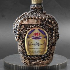 a bottle of crown royal is on display