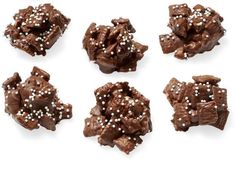 six pieces of chocolate with white sprinkles