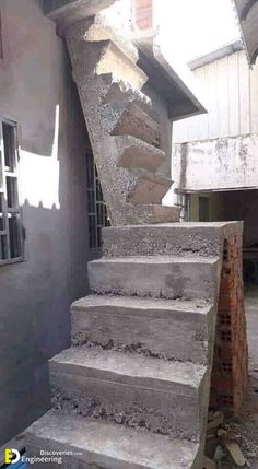 concrete steps in front of a building under construction