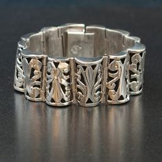 This vintage Taxco sterling silver patterned link bracelet is stunning. This bracelet is very detailed and finely crafted with a beautiful open work pattern. This piece is gorgeous on and would brighten any outfit!Vintage BraceletSterling SilverTaxcoSterling SilverDimensions: 7 1/2" long by 1" widePlease read our shop policies prior to purchase. Thanks for looking and contact us with any questions. Silver Filigree Luxury Bracelet, Luxury Silver Bracelet With Intricate Design, Luxury Silver Filigree Bracelet, Classic Sterling Silver Bangle With Intricate Design, Classic Sterling Silver Bracelet With Filigree, Classic Silver Bracelets With Intricate Design, Ornate Sterling Silver Bracelet For Formal Occasions, Sterling Silver Bracelets With Intricate Design For Formal Events, Sterling Silver Bracelets With Intricate Design For Formal Occasions