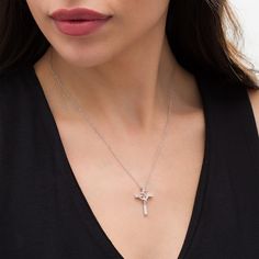 Faith and love shine through this beautiful diamond cross pendant. Fashioned in sterling silver, this blissful choice features a diamond-lined cross with slightly flared edges. A rose gold heart-shaped outline wraps around the center and shimmers with a ribbon with diamonds. Radiant with 1/15 ct. t.w. of diamonds and a brilliant buffed luster, this pendant suspends along an 18.0-inch rope chain that secures with a spring-ring clasp. Rose Gold Crucifix Necklaces For Anniversary, Rose Gold Crucifix Necklaces For Anniversaries, Rose Gold Cross Jewelry For Mother's Day, Rose Gold Sterling Silver Cross Necklace, Elegant Rose Gold Sterling Silver Cross Necklace, Rose Gold Cross Necklace With Diamond Accents, Rose Gold Cross Jewelry With Diamond Accents, Ribbon Heart, Heart Overlay