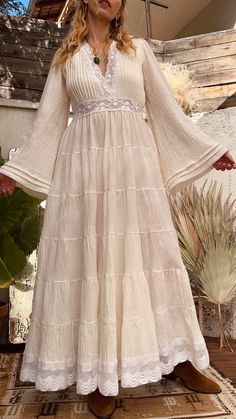 Meet my version of the famous Mexican wedding dresses - voluminous beauty with tiered bottom and glorious angel sleeves.  It is CUSTOM MADE bohemian gauzy maxi dress, made by your measurements.  Deep V-neckline opening, framed with vintage cotton laces. The bodice is adorned with meticulously made pintucks.  Open back and waist closure with vintage buttons.  Wide angel sleeves, that end with pintucks and small vintage lace.  Voluminous skirt part with wide vintage cotton lace.  It moves beautifu