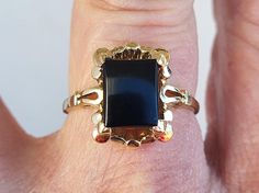 Fresh from an estate this spectacular 10k rare 1940s Edwardian era Art Deco style Gothic look rectangle onyx ladies ring. This is an original antique Edwardian era Art Deco style ladies rectangle shaped onyx ring with a greay Gothic look. Ring is stunning and has very intricate gold work. Onyx in center measures about 10 mm high X  8 mm wide. Stamped with 10k mark inside as shown. Ring is a US size 9 1/2. Ring weights 3.58 grams. Some dings and dents on ring and stone from age but stunning nonet Vintage Rectangular Jewelry With Polished Finish, 14k Gold Rectangular Jewelry For Evening, Victorian 14k Gold Rectangular Jewelry, Victorian Style 14k Gold Rectangular Jewelry, Victorian Style Rectangular 14k Gold Jewelry, Rectangular 14k Gold Collectible Jewelry, Formal Victorian Jewelry With Rectangular Shape, Victorian Rectangular Polished Jewelry, Rectangular Victorian Jewelry For Formal Occasions