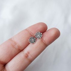 Real 925 Sterling Silver Boho Flower Stud Earrings These lovely earrings can be used in Earlobe, Tragus and Cartilage. Measures 9mm Comes with pushback backings Jewelry will come in a gift box * Please read shop policy before placing an order * *JEWELRY CARE* Sterling Silver will tarnish over time, but to help keep your jewelry looking beautiful - Clean with a soft dry cloth after wear and store inside an airtight bag or container. Remember to remove your jewelry when: * Applying lotion or sunsc Tragus Piercing, Flower Stud Earrings, Tragus Piercings, Flower Stud, Flower Earrings Studs, Lovely Earrings, Flower Studs, Tragus, Helix