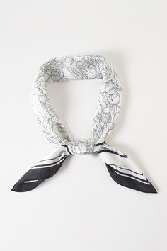 Expertly crafted with an intricate floral print, this square bandana scarf adds a touch of elegance to any outfit. Made from high-quality material, it offers both style and functionality. Perfect for adding a pop of color or accessorizing any look. Dress it up or down, the possibilities are endless. 27.5" W x 27.5" L 100% Polyester Traditional White Bandana With Bandana Print, Black And White Bandana, White Bandana Print Scarf, Store Hours Sign, Black Bandana Print Headscarf, Casual Bandana Print Headscarf, One Size, Coffee Candle, Bandana Scarf, Bandana Print