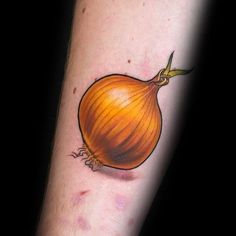 an onion tattoo on the arm