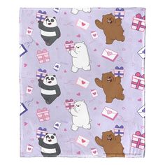 a blanket with bears and gifts on it in pastel purple, pink and white