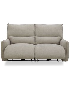 the reclining sofa is shown with two arms and headrests, both facing each other