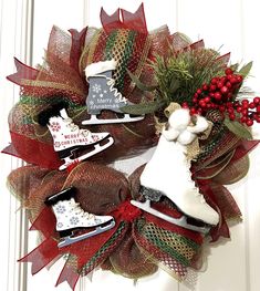 a christmas wreath with ice skates on it